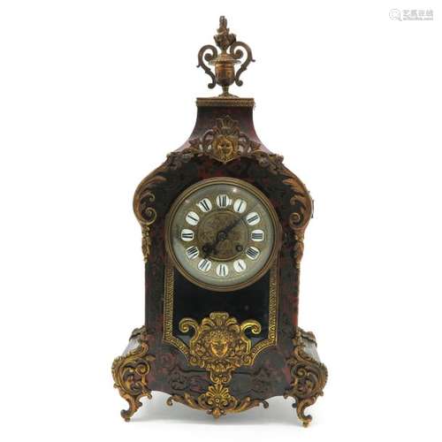 A 19th Century Bouille Clock 47 cm. Tall. This lot...