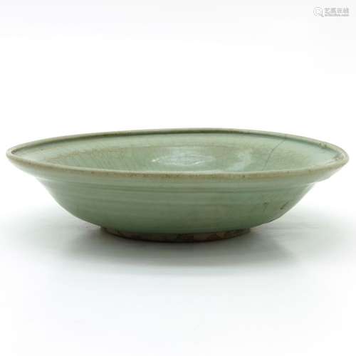 A Celadon Dish Crackleware background, 27 cm. In d...