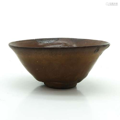 A Brown Glaze Tea Bowl On small circular foot, 11 ...