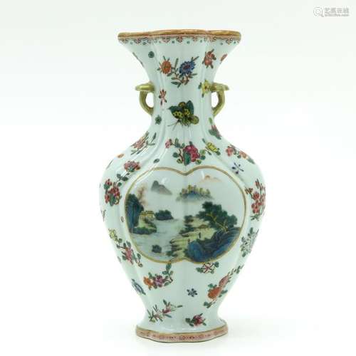 A Polychrome Decor Vase Top is open for placing fl...