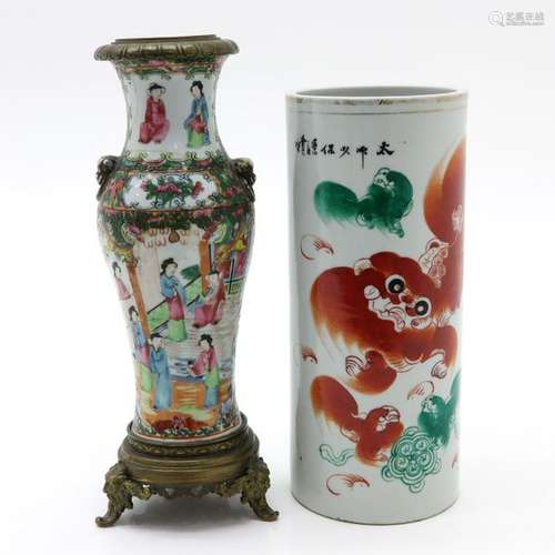 A Polychrome and Cantonese Vase Tallest is 31 cm.,...