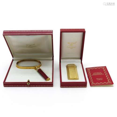 A Cartier Lighter and Magnifying Glass Both Cartie...