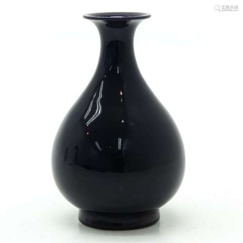 A Purple Glaze Vase 14 cm. Tall.		A Purple Glaze ...