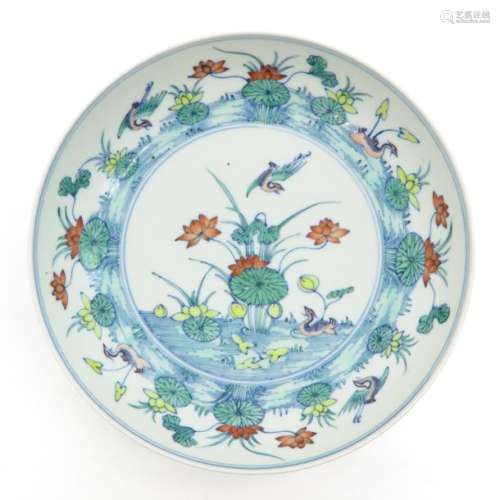 A Doucai Decor Plate Depicting flowers and birds o...