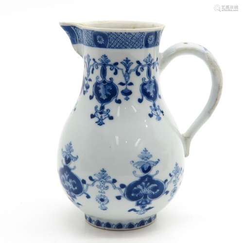 A Blue and White Pitcher Floral decor, 18 cm. Tall...