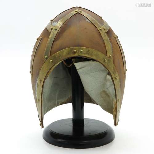 A Helmet Replica, 30 cm. Tall.		A Helmet Replica,...