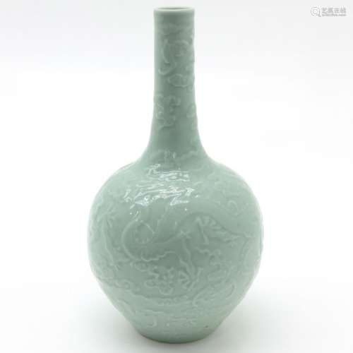 A Celadon Vase Depicting dragons and clouds, marke...