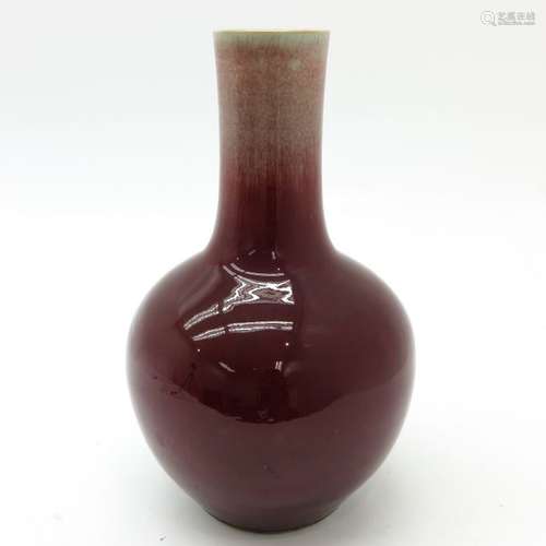 A Sang de Boeuf Vase 40 cm. Tall. Top restored.		...