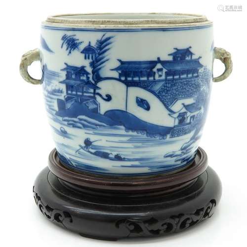 A Blue and White Pot on Carved Wood Vase Depicting...