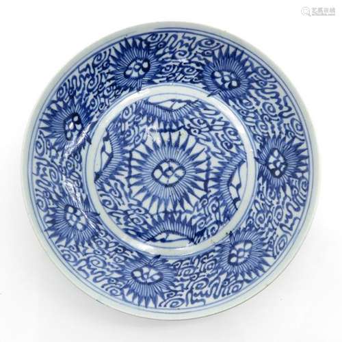 A Blue and White Plate Floral decor, 25 cm. In dia...