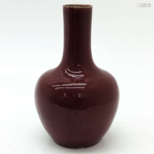 An Oxblood Decor Vase 36 cm. Tall, restored.		An ...