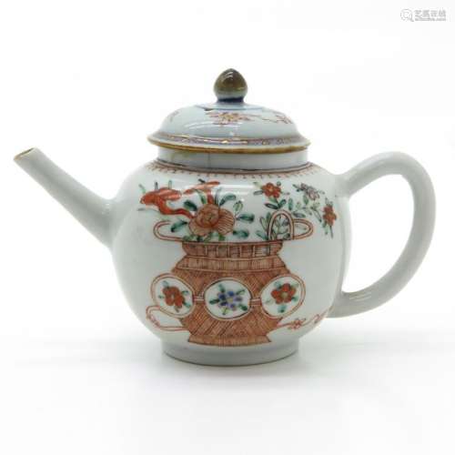 A Polychrome Decor Teapot Depicting flowers in bas...