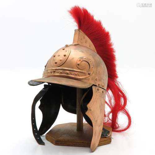 A Helmet Replica, 40 cm. High.		A Helmet Replica,...