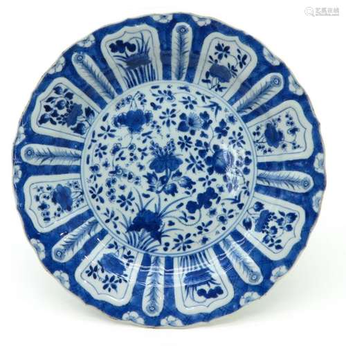 A Blue and White Plate Full floral decocr with alt...