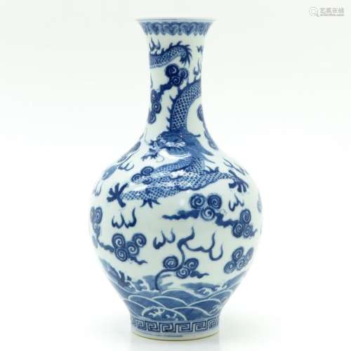 A Blue and White Dragon Vase Depicting clouds and ...