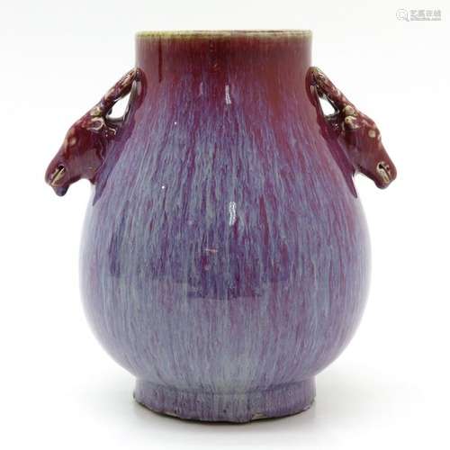 A Red Glaze Vase with Deer Handles 27 cm. Tall.		...