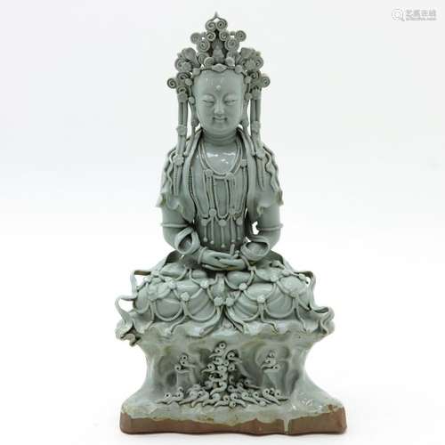 A Glazed Pottery Buddha Light green glaze, 51 cm. ...