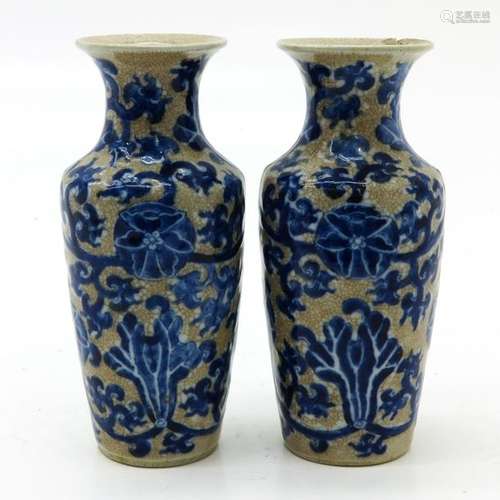 A Pair of Crackleware Vases Blue floral decor on c...