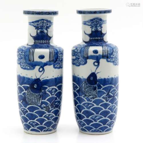 A Pair of Blue and White Rouleau Vases Depicting s...