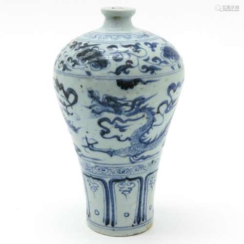 A Blue and White Vase Depicting dragons and clouds...