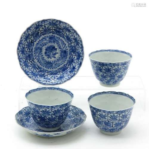 A Lot of Blue and White Cups and Saucers Including...