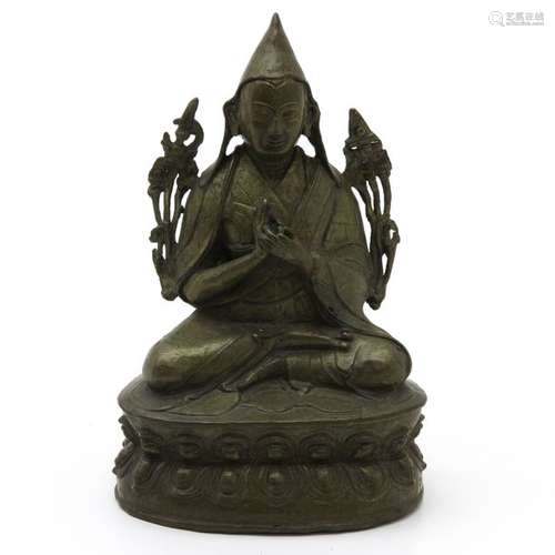 A Bronze Buddha Sculpture Depicting seated Buddha,...