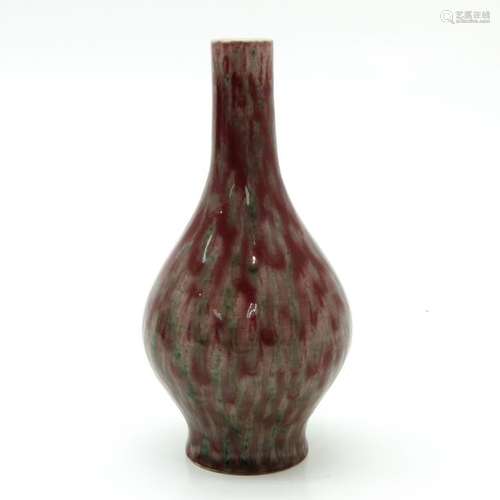 A Red Glaze Decor Vase 20 cm. Tall.		A Red Glaze ...