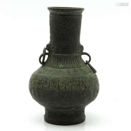 A Bronze Vase Ringed handles, 23 cm. Tall.		A Bro...