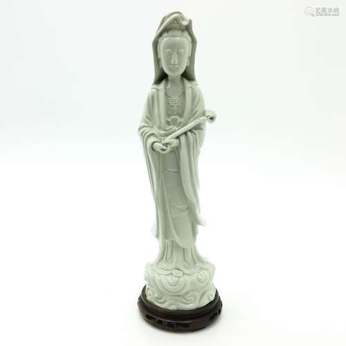 A Blanc de Chine Quanyin Sculpture Including carve...