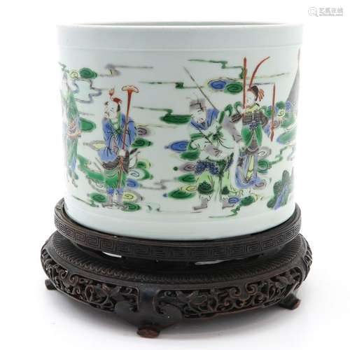 A Famille Verte Brush Pot on Carved Wood Base Depi...