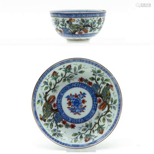 A Polychrome Decor Cup and Saucer Floral decor wit...