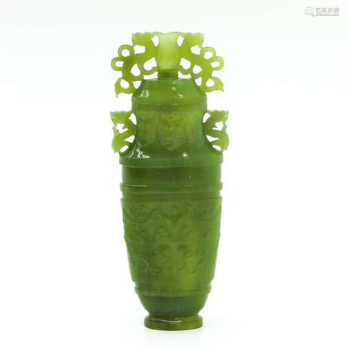 A Carved Jade Vase with Cover 25 cm. Tall, chip.	...