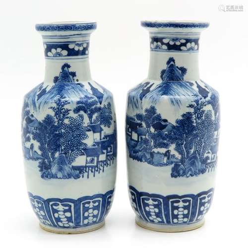 A Pair of Blue and White Rouleau Vases Depicting l...