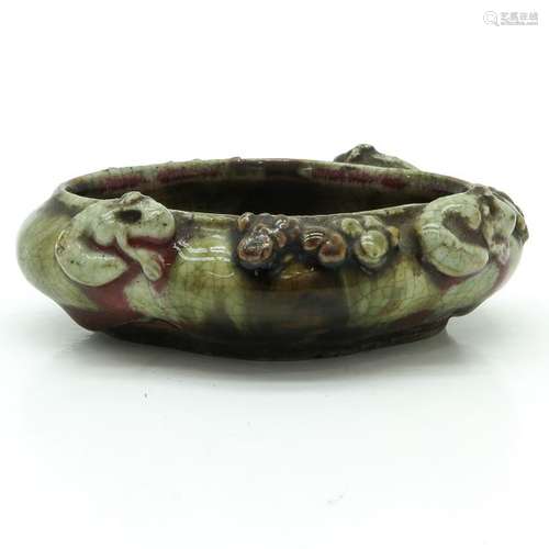 A Crackleware Decor Brush Washer Depicting animals...