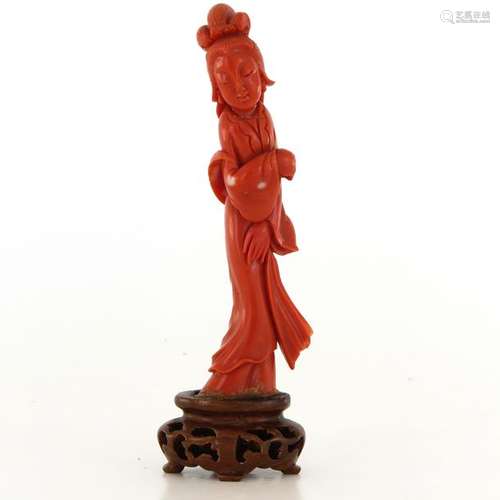 A Carved Red Coral Sculpture Depicting Quanyin, 13...