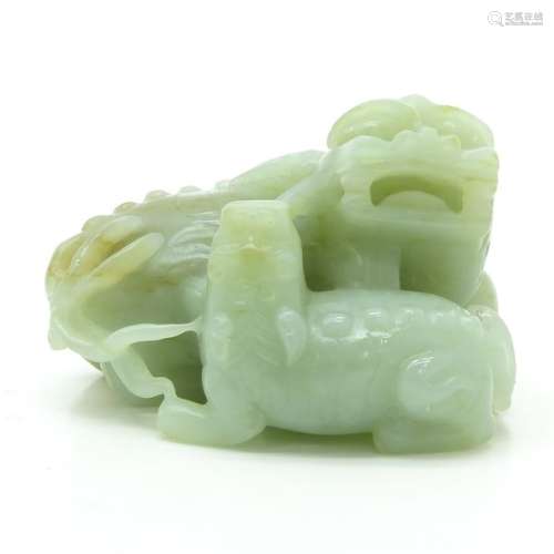 A Carved Jade Temple Lion Sculpture Depicting 2 te...