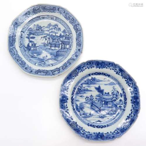 A Lot of 2 Blue and White Plates Both in landscape...