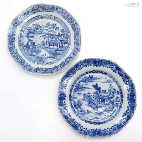 A Lot of 2 Blue and White Plates Both in landscape...