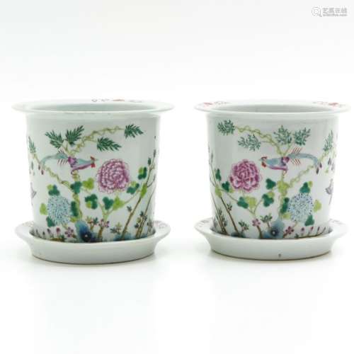 A Pair of Famille Rose Cachet Pots with Under Plat...