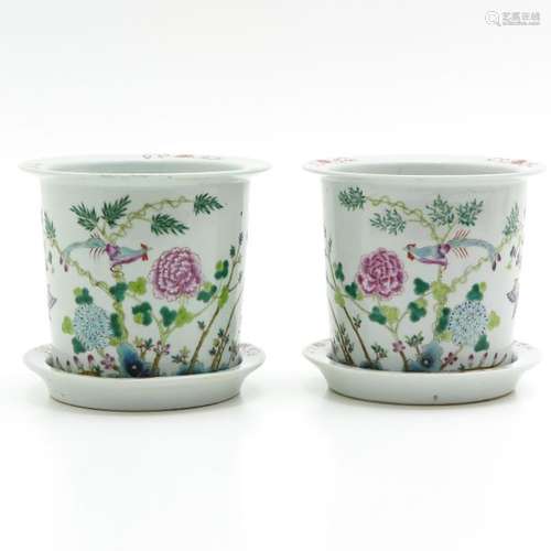 A Pair of Famille Rose Cachet Pots with Under Plat...