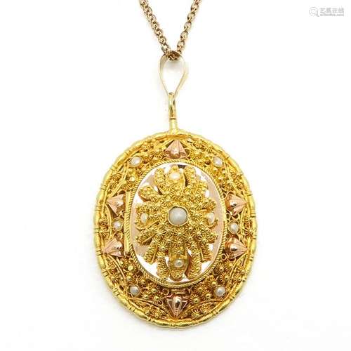 A Gold Pendant Locket Made from jewelry worn in Sc...