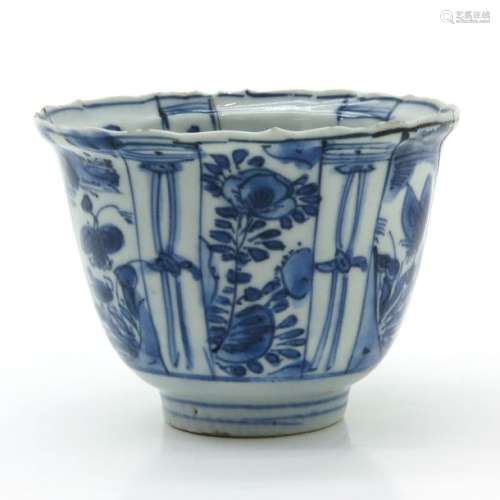 A Blue and White Lobed Cup Depicting floral decor,...