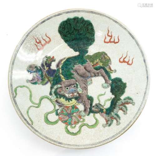 A Polychrome Decor Plate Crackleware ground, depic...