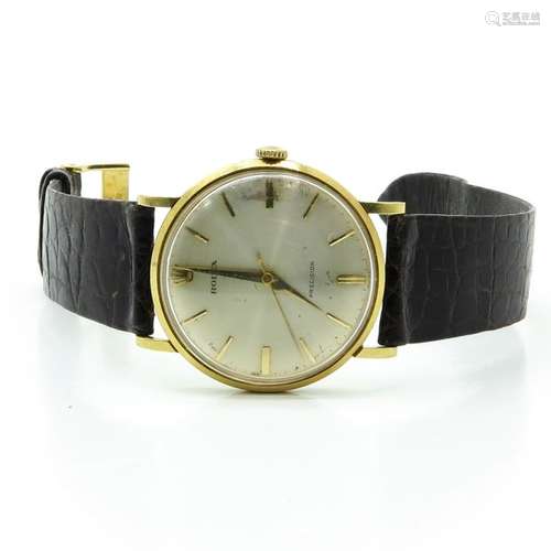 A Mens Rolex Gold case on leather band.		A Mens R...