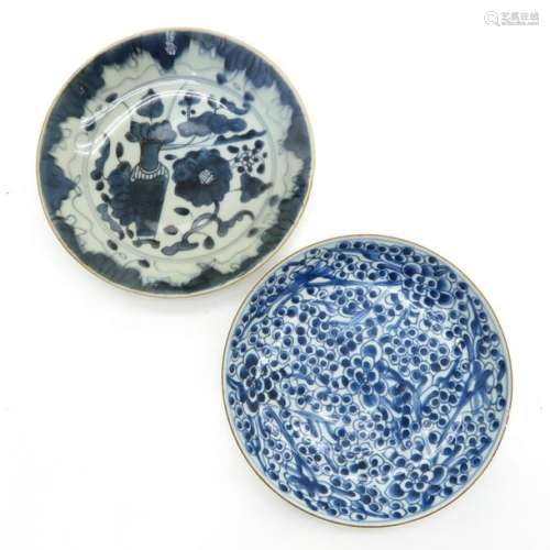A Lot of 2 Blue and White Plates Including one peo...
