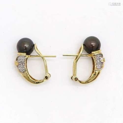 Black Pearl and Diamond Earrings Set in gold.		Bl...