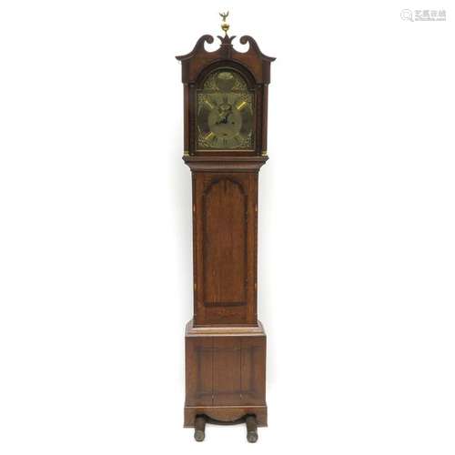 A 19th Century English Standing Clock 19th Century...