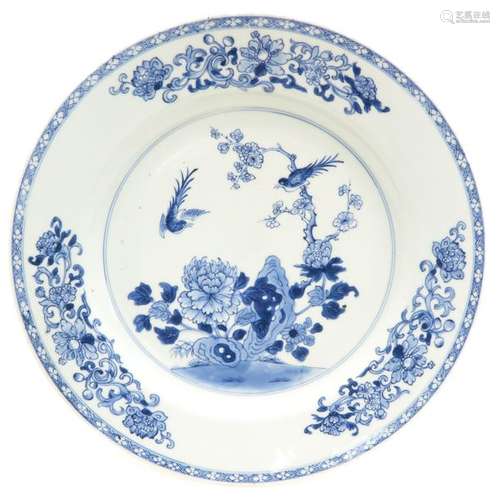 A Blue and White Charger Floral decor with birds, ...