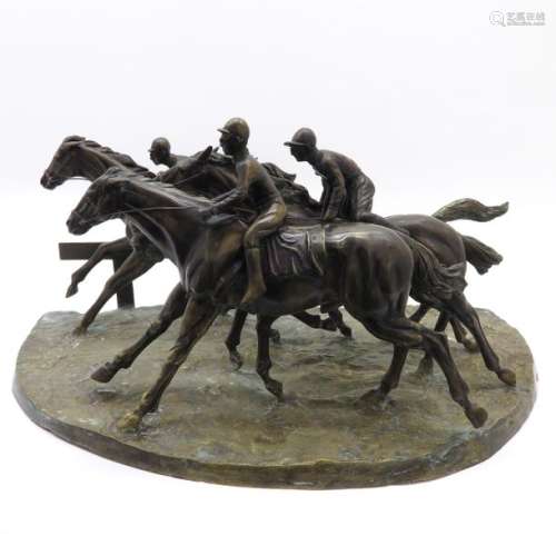 A Signed Bronze Jockey Sculpture 92 cm. Long.		A ...
