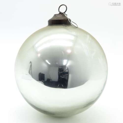 A Silver Glass Witch Ball 30 cm. In diameter.		A ...